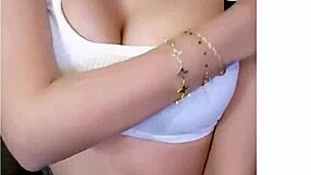 Liloo enjoys caressing her big tits