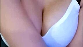 Liloo enjoys caressing her big tits