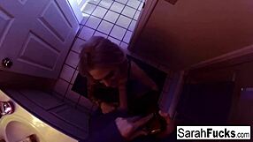 pornstar sarah jessie delivers a blowjob in the bathroom, leading to a cumshot