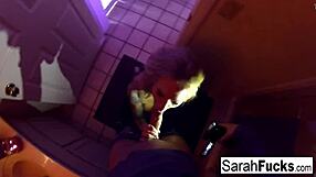 pornstar sarah jessie delivers a blowjob in the bathroom, leading to a cumshot