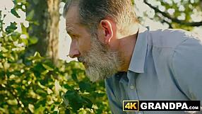 Young Babe Swallows and Rides Older Big Cock in Outdoor Action