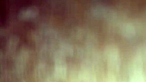 ann casually sucking on a black lollipop treat