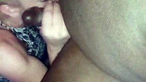 ann casually sucking on a black lollipop treat