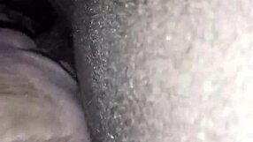 ann casually sucking on a black lollipop treat