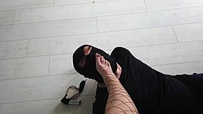 Look at her feet under fishnet stockings