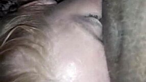 ann casually sucking on a black lollipop treat