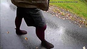 Woman in pantyhose outdoors says, 'This is public.'