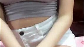 Asian babe shows big tits and ass on webcam