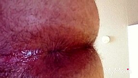 feeling intense pleasure as gay guy gapes his ass with anal play.