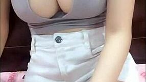 Asian babe shows big tits and ass on webcam