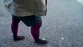 Woman in pantyhose outdoors says, 'This is public.'