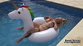 aviva rocks with big tits and ass tattoo masturbating on unicorn