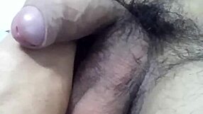 Gay man in kitchen sucking cock while preparing meal