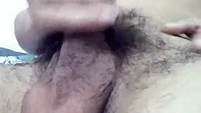 Gay man in kitchen sucking cock while preparing meal