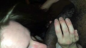A white chick sucks a black cock close up in homemade interracial blowjob.