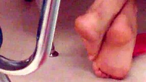 Playful Latina Shows Soles in Classroom