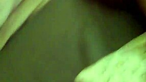 Amanda showcases her large breasts and curvy body.