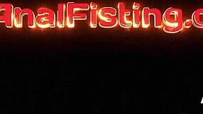 These wicked lesbians are casually fisting each other's assholes while licking ass