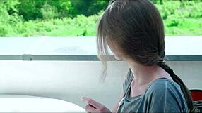 busty russian babe ethelle undresses in softcore solo scene.