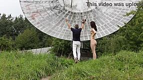 Brunette's Natural Tits Exposed in Public Nude Shoot Near Old Space Radar