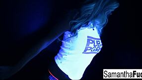 samantha saint touches her big tits and ass in black light solo