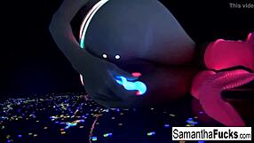 samantha saint touches her big tits and ass in black light solo