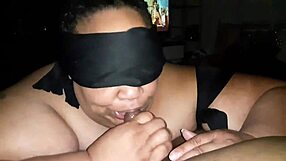 The big couple enjoys a super blowjob while blindfolded, adding excitement to their intimate moment.