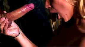 sexy blonde sarah swallows huge cock through glory hole with skill