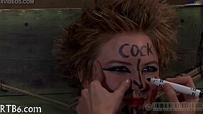 the girl tries out the fucking machine in a sadomasochism session, her body responding to the mechanical thrusts