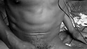 Stroking my big black cock in black and white until I cum.