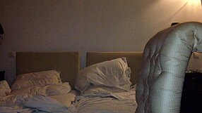 She moans loudly as the shemale fucks her ass in the hotel room