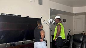 Construction worker Kendale assists his client on the job