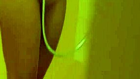 brunette with tattoos has a nice shower