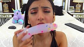 Perfect model blows on webcam in a steamy session