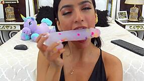 Perfect model blows on webcam in a steamy session