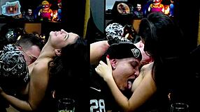 Ruan and Everton Olivrs suck Natasha Steffens' natural tits through sheer red top, making her moan with pleasure