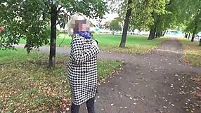 Mature blonde milf walks outdoors in see-through nylon, teasing big tits