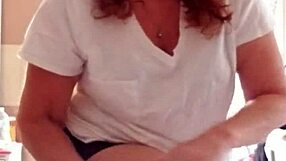 She Lotions Her Sexy Mature Pussy