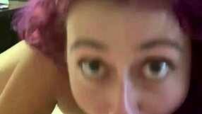 Purple haired girl sucking cock with intriguing skill