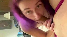 Purple haired girl sucking cock with intriguing skill