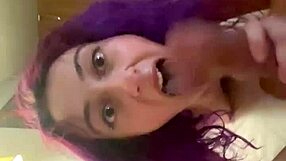 Purple haired girl sucking cock with intriguing skill