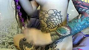 Tattooed teen practices homemade skills