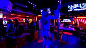 Athletic Latina couple engages in bedroom teasing with shoes.