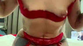 Alina modelista in red lingerie teasing with oil