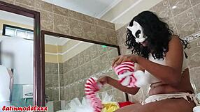 Big Tits Model Prepares for Halloween Photoshoot