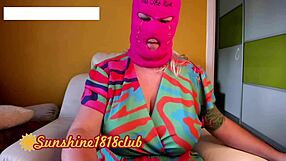 Neon pink skimaskgirl shows big boobs on webcam recording
