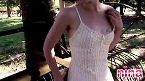 Nina says, 'Watch me rub my sexy pussy outdoors.'