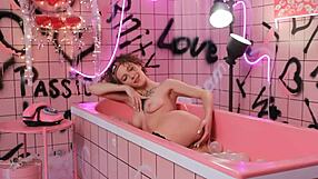 Anita relaxes in a pink trash bath behind the scenes