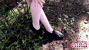 Nina says, 'Watch me rub my sexy pussy outdoors.'