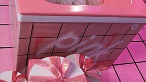 Anita relaxes in a pink trash bath behind the scenes